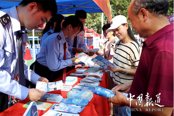 中国报道：税惠春风伴奔跑 便民服务暖赛道